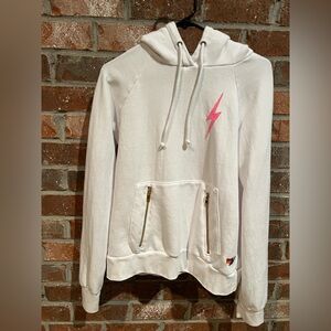 Aviator Nation white Hoodie with a pink lightning bolt graphic -size Medium